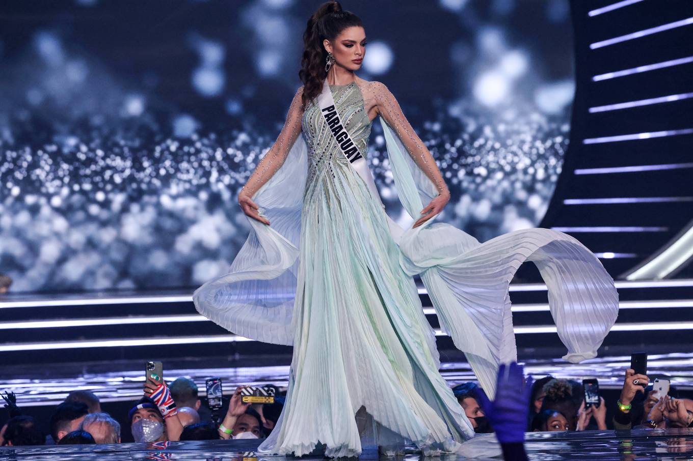 Miss Paraguay, Nadia Ferreira, presents herself on stage during the preliminary stage of the 70th Miss Universe beauty pageant in Israel's southern Red Sea coastal city of Eilat on December 10, 2021. (Photo by Menahem KAHANA / AFP)