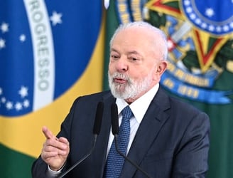 (FILES) Brazilian President Luiz Inacio Lula da Silva delivers a speech during the launching of the Health Economic-Industrial Complex program at Planalto Palace in Brasilia on September 26, 2023. Brazil's President Luiz Inacio Lula Da Silva is not welcome in Israel until he apologises for comparing its ongoing war against Hamas to the Holocaust, the country's foreign minister said on February 19. Lula's remarks on Sunday sparked outcry in Israel after the Brazilian leader said the ongoing conflict in the Gaza Strip “isn't a war, it's a genocide” and compared it to “when Hitler decided to kill the Jews”. (Photo by EVARISTO SA / AFP)