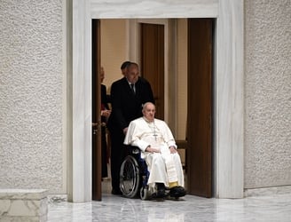 Pope Francis arrives for the weekly general audience on February 28, 2024 at Paul-VI hall in The Vatican. (Photo by Tiziana FABI / AFP)