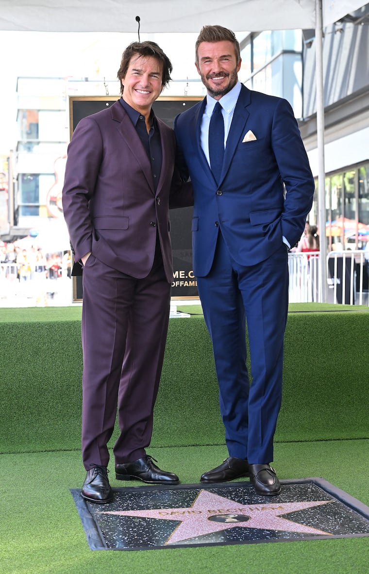 Tom Cruise y David Beckham. Foto: Lisa O'Connor / AFP
