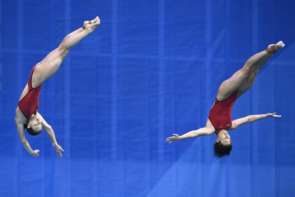 Las chinas que se llevaron en oro, en acción. Martin BUREAU / AFP