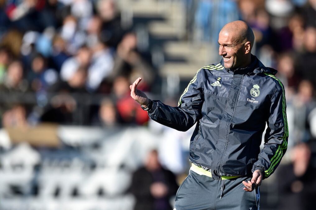 Real Madrid's new French coach Zinedine Zidane gestures during his first training session as coach of Real Madrid at the Alfredo di Stefano stadium in Valdebebas, on the outskirts of Madrid, on January 5, 2016. Real Madrid legend Zinedine Zidane promised to put his "heart and soul" into managing the Spanish giants after he was sensationally named as coach following Rafael Benitez's unceremonious sacking.   AFP PHOTO/ GERARD JULIEN / AFP / GERARD JULIEN