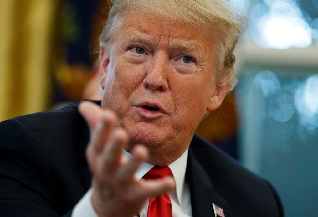 President Donald Trump speaks during an interview with The Associated Press in the Oval Office of the White House, Tuesday, Oct. 16, 2018, in Washington. (AP Photo/Evan Vucci)

